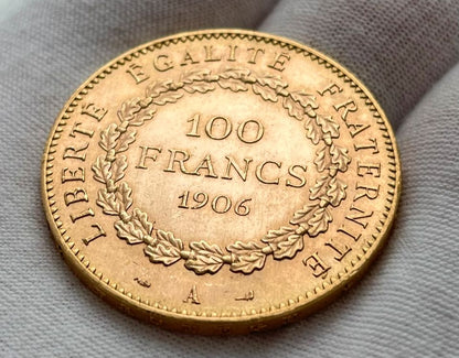 Lot 2 Pièces d'or – Saint-Gaudens Double Eagle 1910D & 100 Francs Ange 1906
